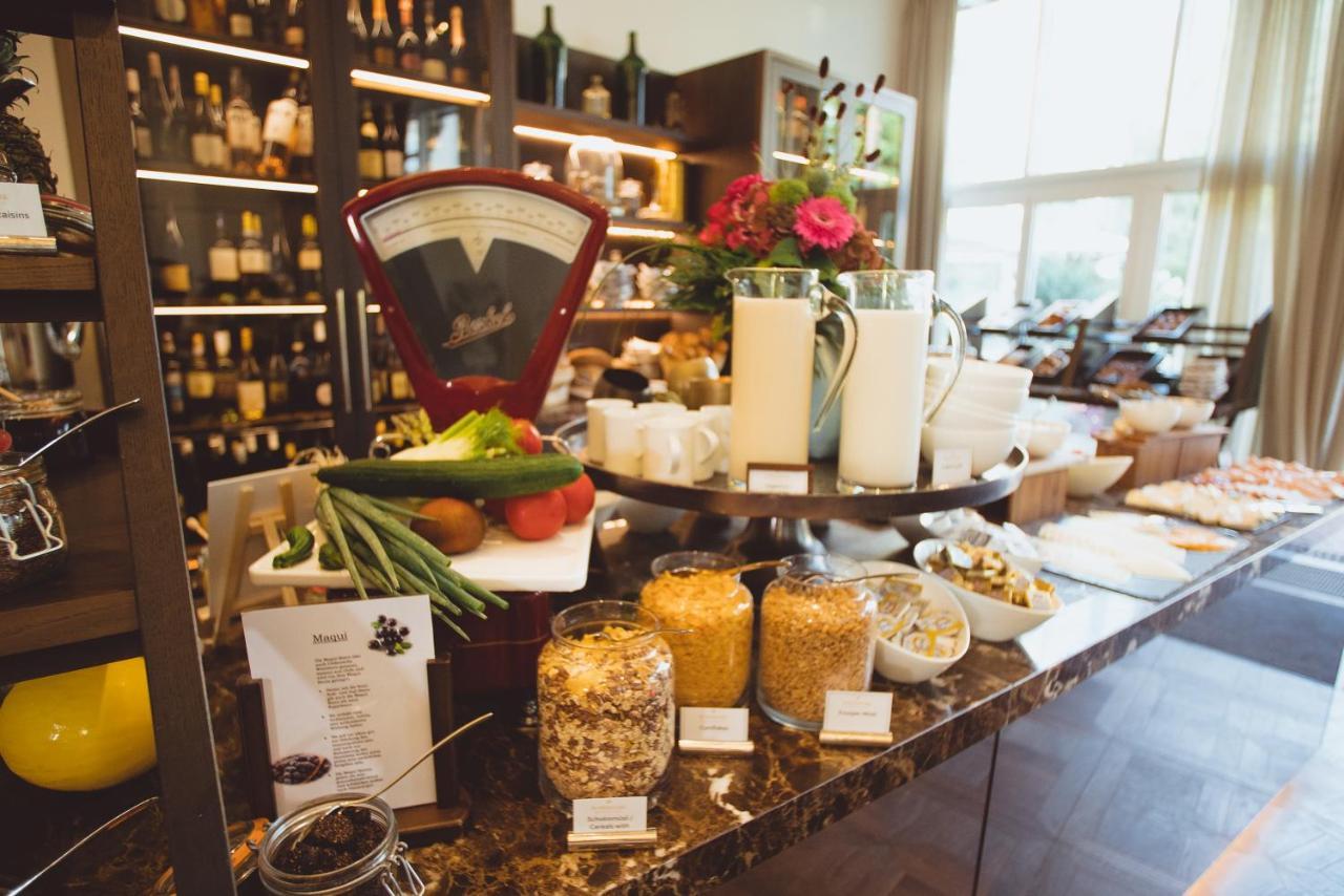 ヴィラ ヴィタ ホテル ＆ レジデンツ ローゼンパーク マールブルク Marburg エクステリア 写真 A display of various types of honey at a hotel in London